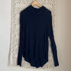 Free People,oversized black turtleneck,size medium. Oversized, distressed